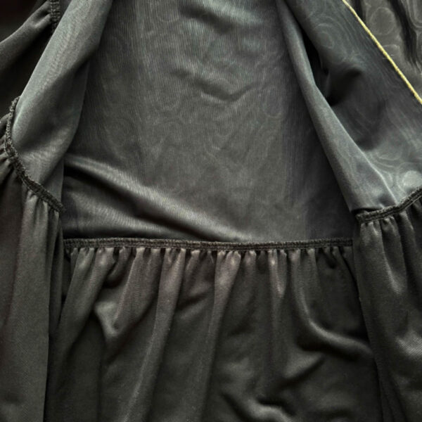Manteau leger d'interieur noir dore Elephant Paris vintage